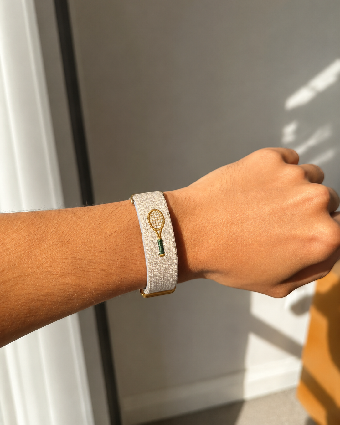 Ecru tennis embroidered band worn on the wrist - Lorenzi Paris